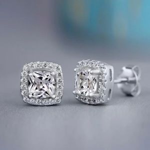 New silver earrings, cubic square zirconia.